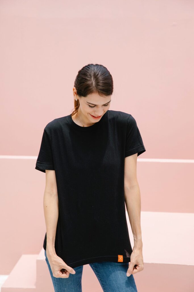 Woman with Orange Whale black t-shirt